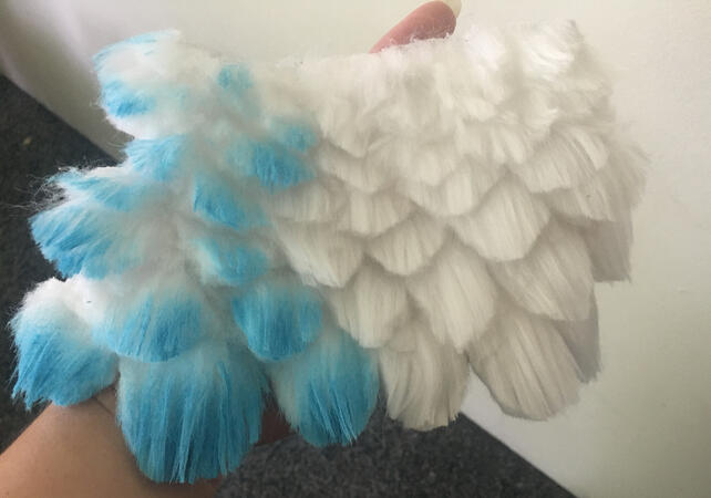 Test strip of cutting faux feathers from faux fur and seeing effect of a thinned acrylic paint to stiffen the fibers Test strip of cutting faux feathers from faux fur and seeing effect of a thinned acrylic paint to stiffen the fibers