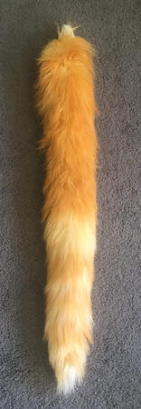 Orange tabby tail made from faux fur and hand-dyed with acrylic paint Orange tabby tail made from faux fur and hand-dyed with acrylic paint